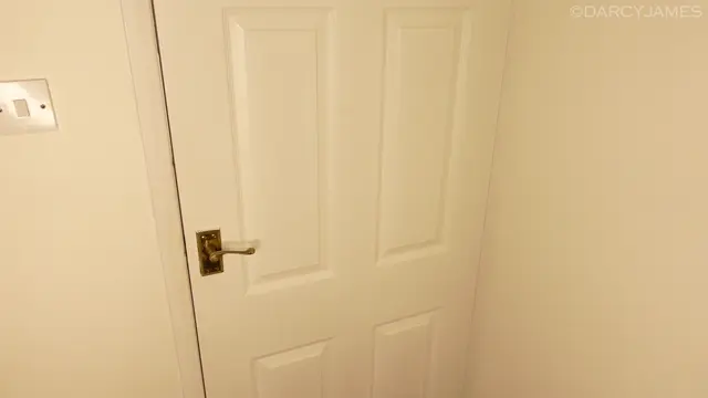 Poster: Darcy James – Cucked Behind The Door
